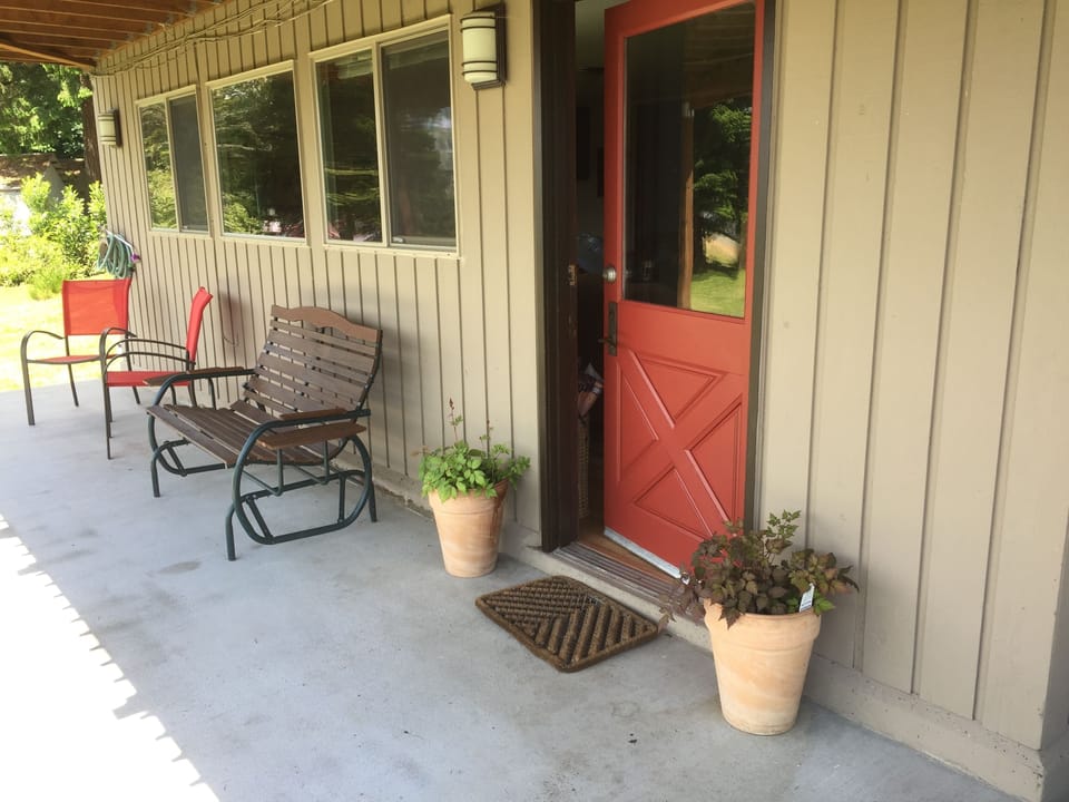 The patio is protected from the sun and looks out over the inner harbor.