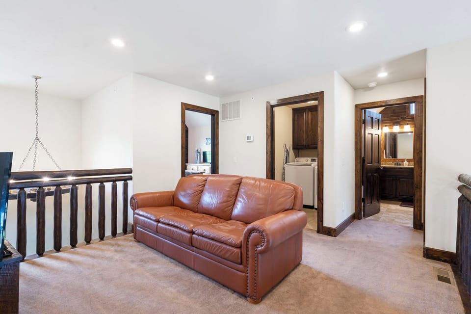 Sleeper sofa in the loft area outside of the master bedrooms