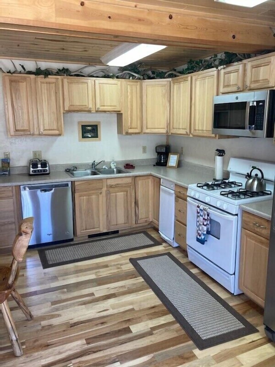 Kitchen updated in 2022: new floor, table and newer appliances.