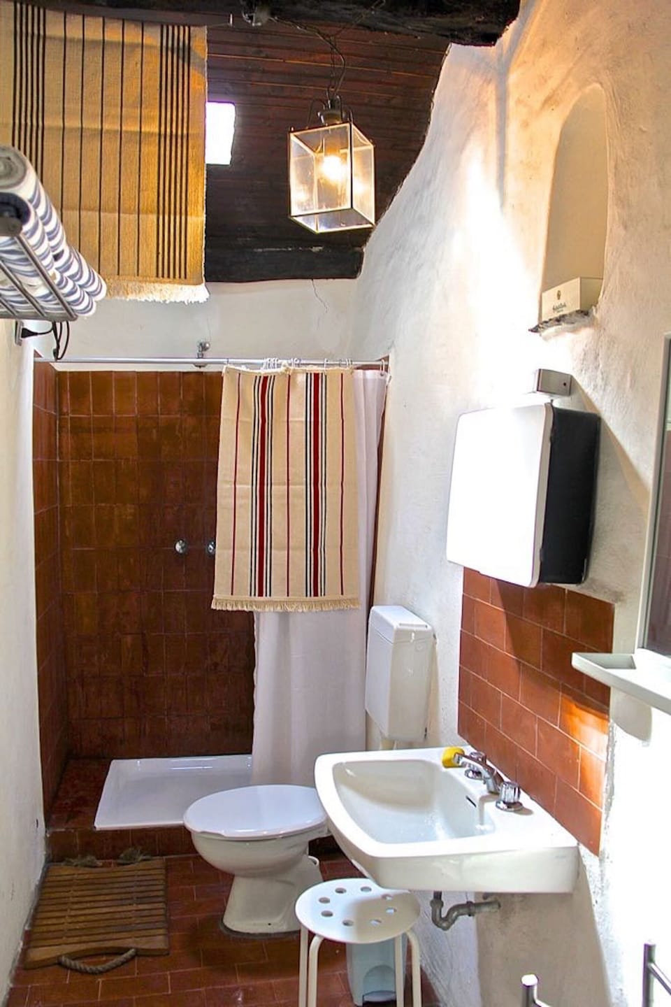 The bathroom has a shower and plenty of hot water, which heats up fast in the bo