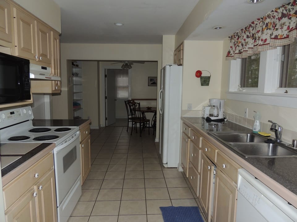 Kitchen with breakfast nook; entrance into laundry room