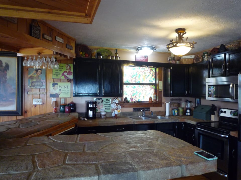 VERY SPACIOUS open-plan kitchen has lots of counter & cabinet space 