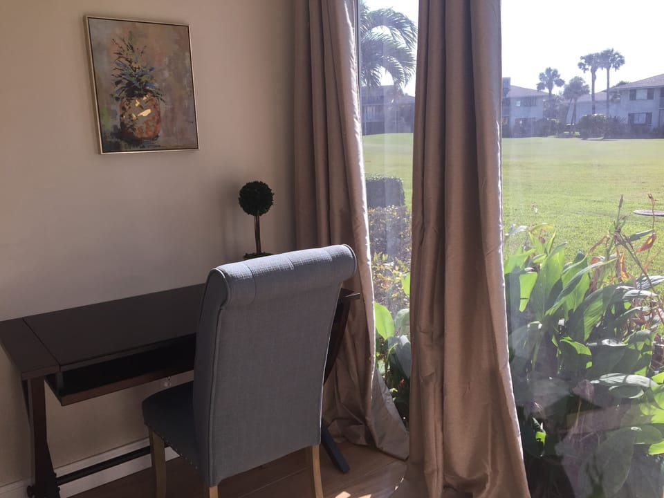 Computer desk in alcove.
