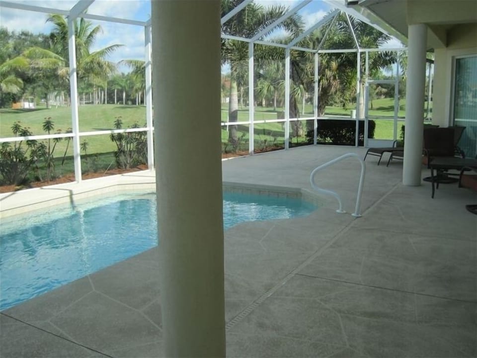 patio,pool and view of golf course