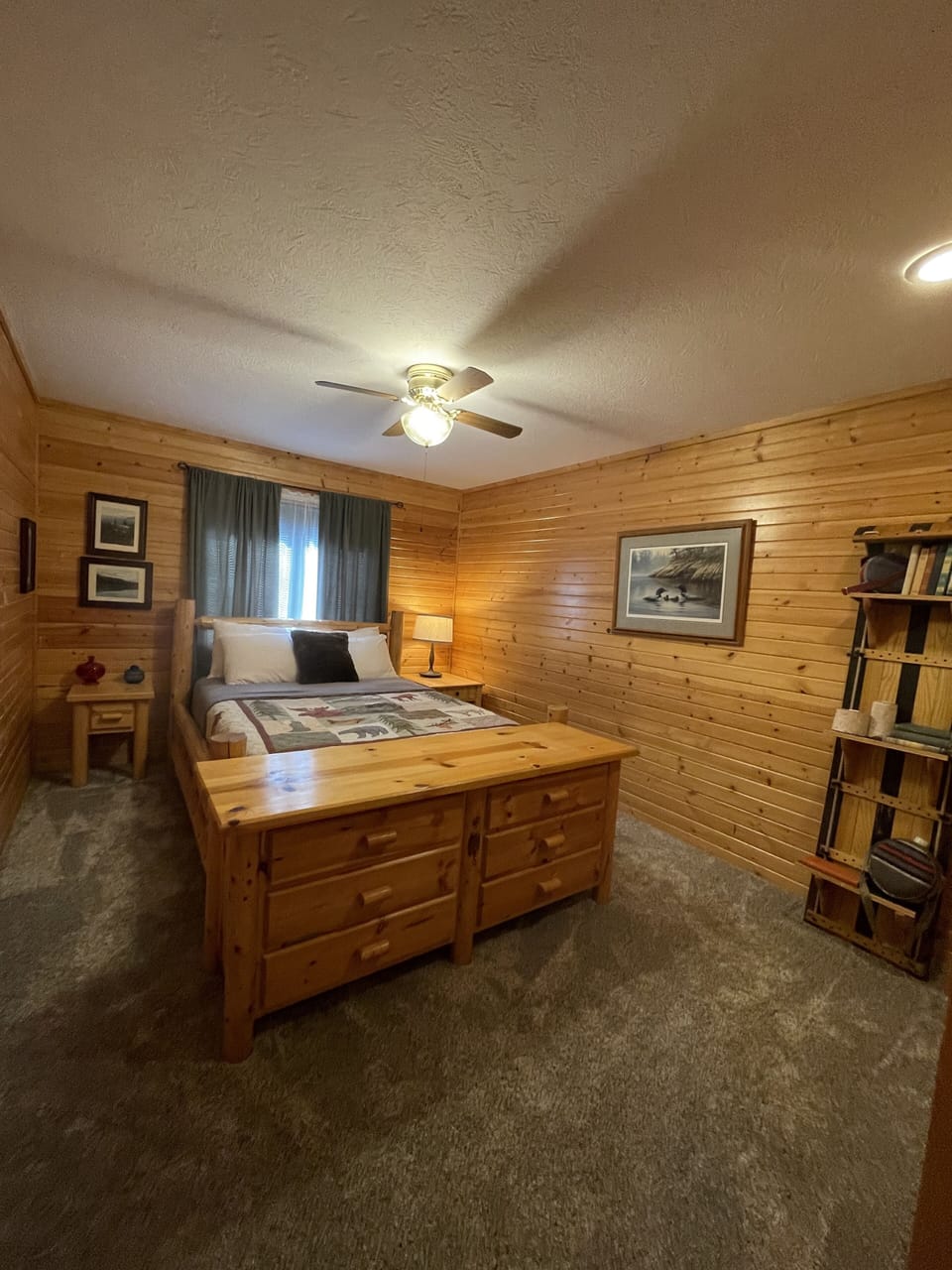 Main level bedroom 2.  Queen bed. 