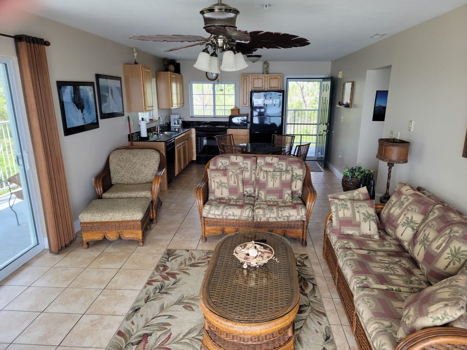 Living Room/Kitchen View from Lakefront patio. 