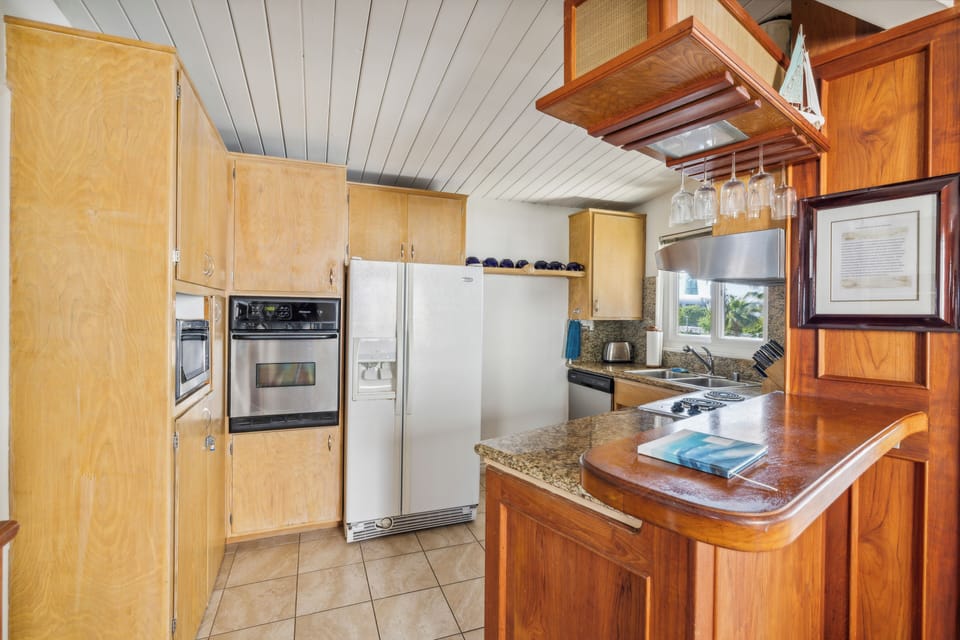Kitchen pass through to living room.  There is also a microwave to the left!