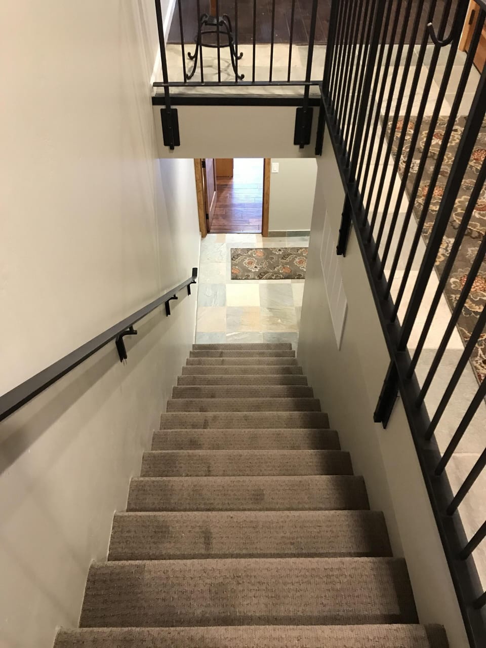 Looking down stairs from entry way.