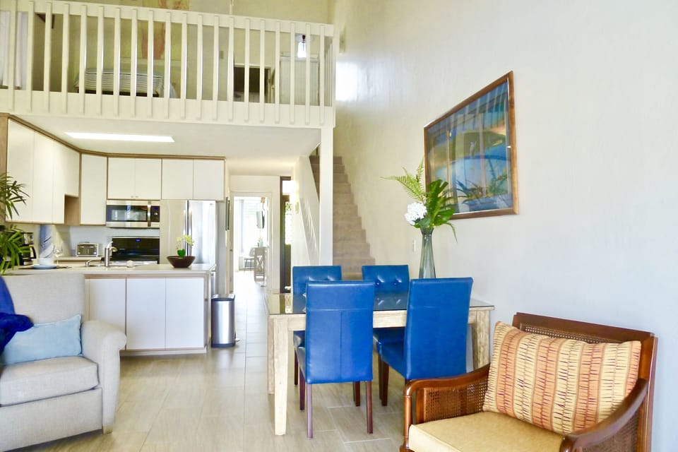 Above is the loft area with the master bedroom door behind it. 