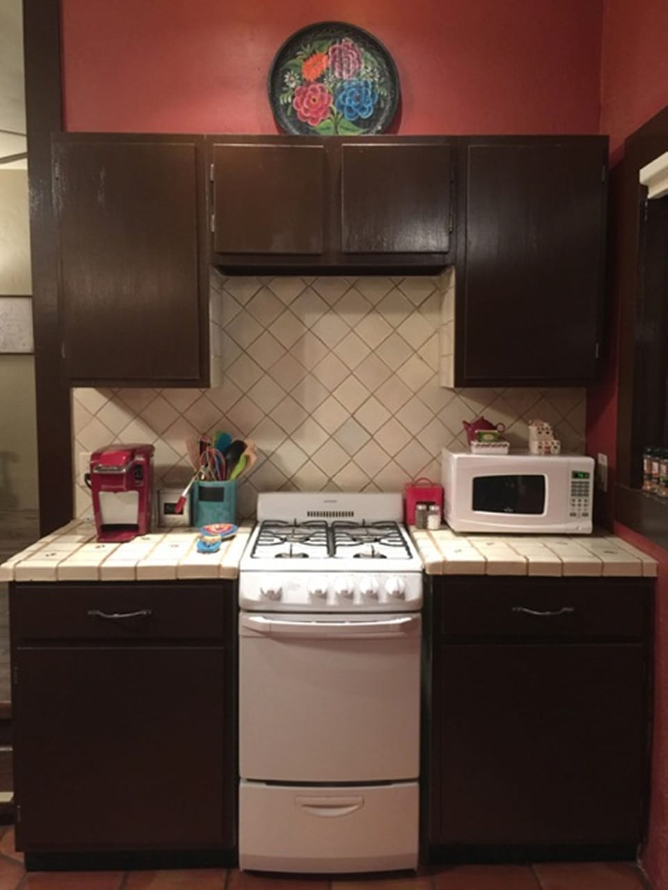Full kitchen with vintage Mexican tiles- all you need to prepare meals at home