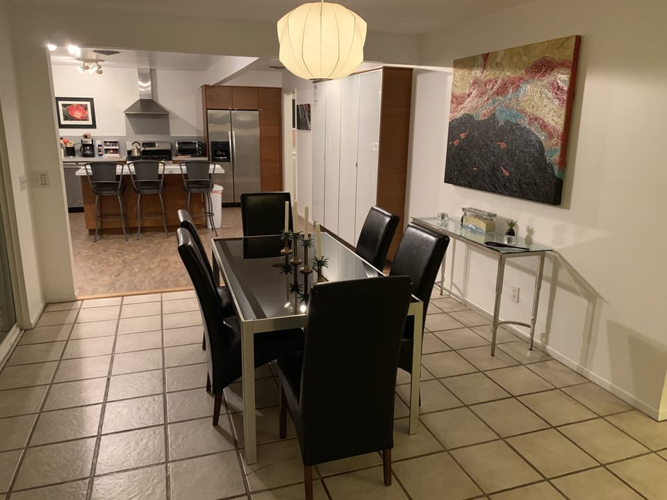 Formal dining off the kitchen and with pool views!
