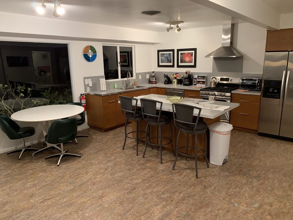 Kitchen with breakfast bar and table!
