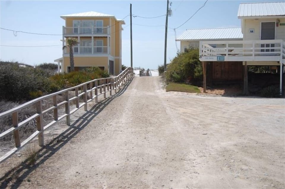 View of the beach entry from in front of the cottage. Very short walk.