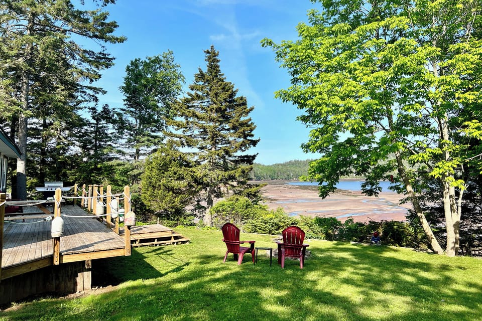 We have a large lush lawn perfect for lounging, playing games, or having a BBQ