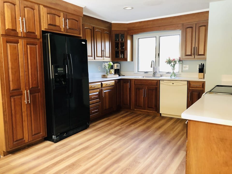 Kitchen with corian countertop. Just recently remodeled!