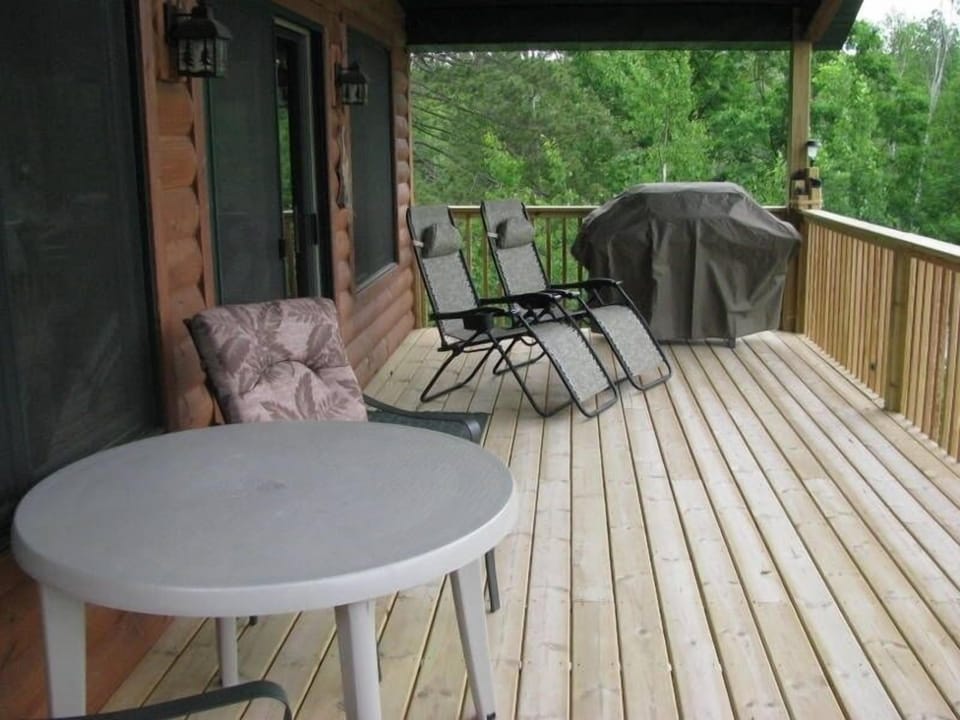 Enjoy the deck overlooking the lake.