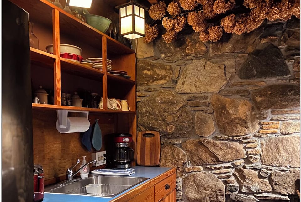 Kitchen with fridge in left foreground