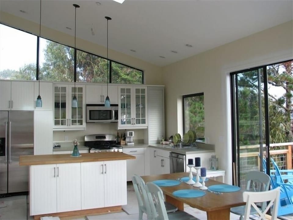 brand new stainless appliances with island seating for all to enjoy