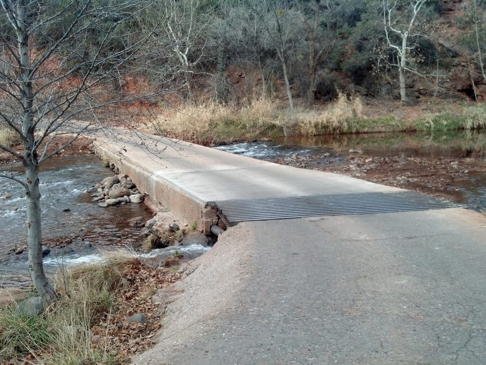 Oak Creek crossing, only road access - must use elevated footbridge when flooded