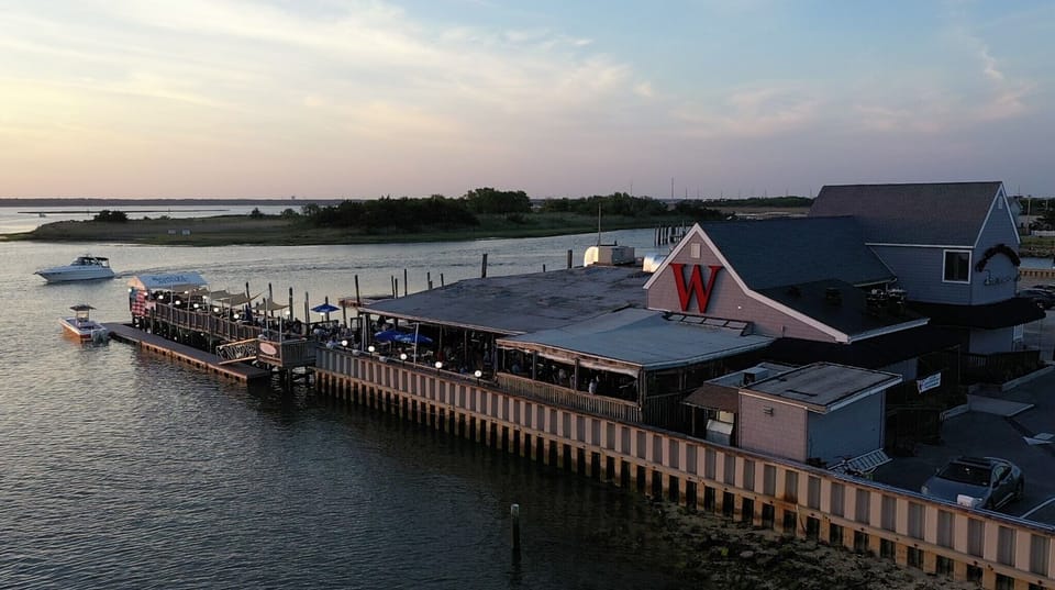 Walk to The Wharf restaurant and beach bar the end of our street on the bay.