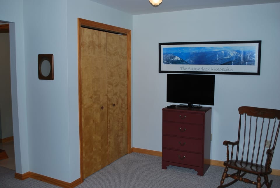 A full closet keeps order in the "Bear Den."