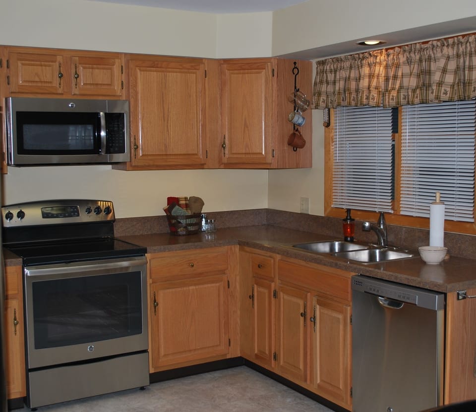 Home entrance is through foyer into kitchen. Drop spot for coats, boots etc. 