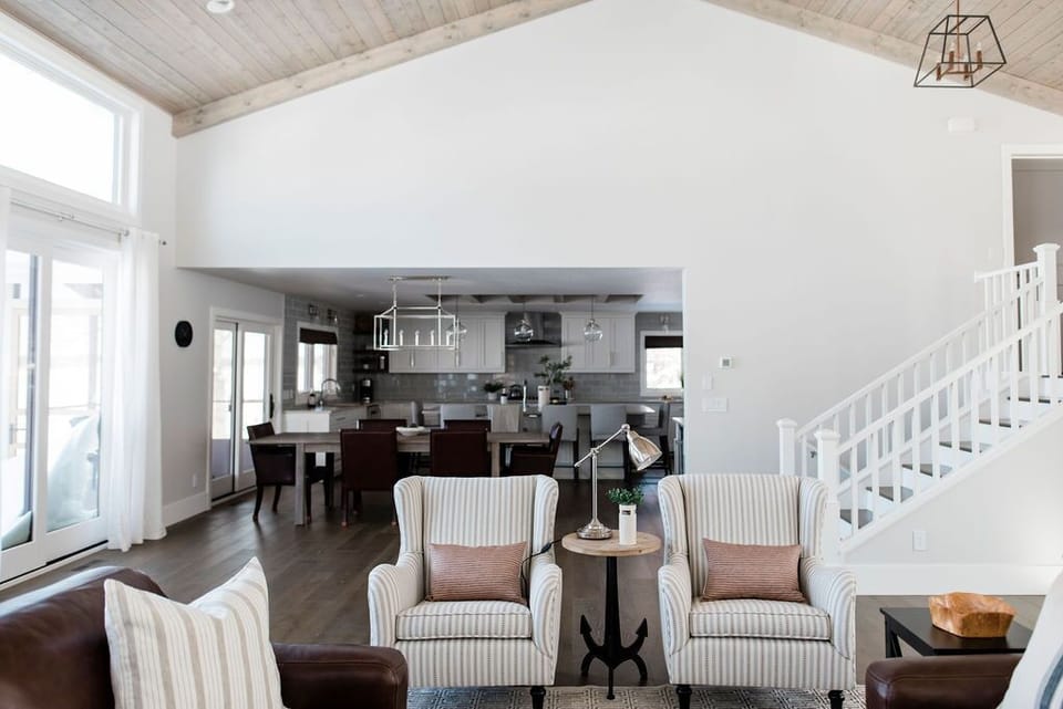 The great room conveniently adjoins the dining room and open concept kitchen