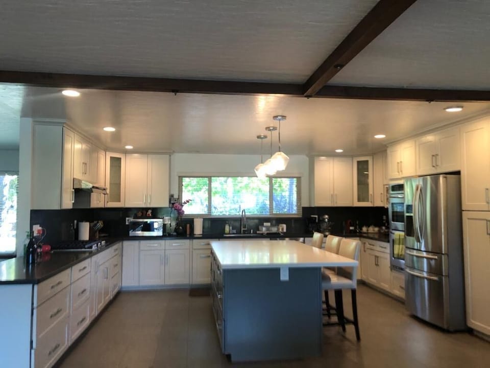 kitchen view entering from the backyard/pool area