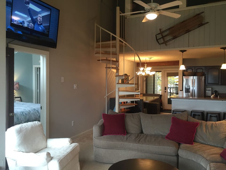 wood floors and staircase is now black also upstairs is enclosed