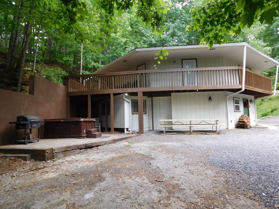 Ground level entry with grill/spa/picnic table and large wraparound deck!