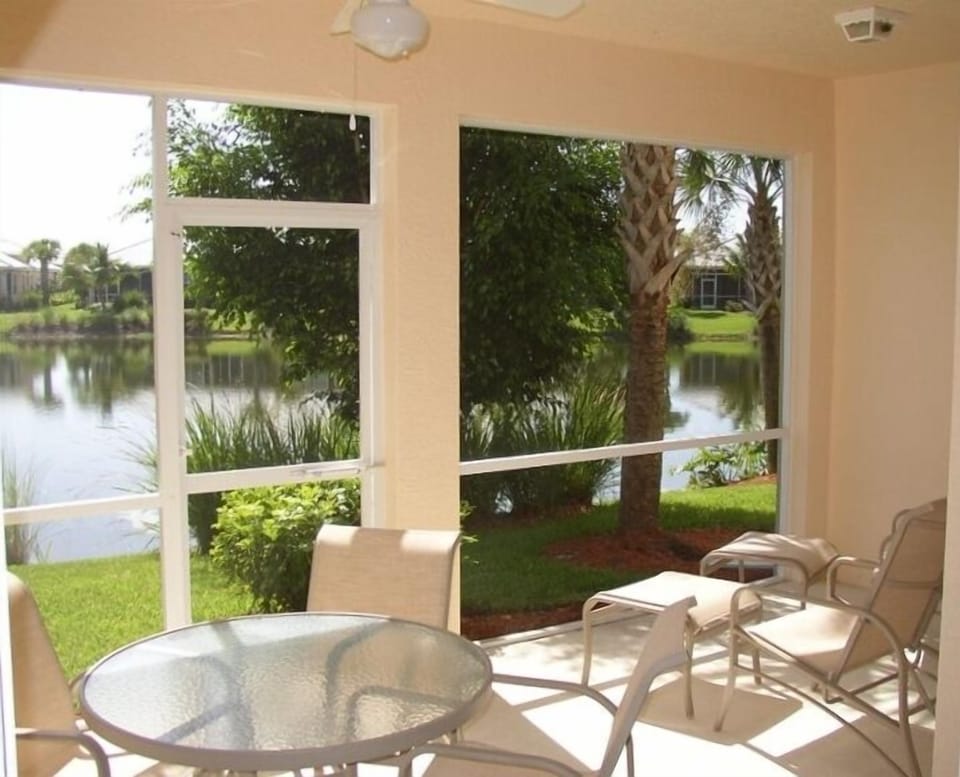 Screened in lanai. Perfect for quiet coffee in the morning, in the warm sunshine
