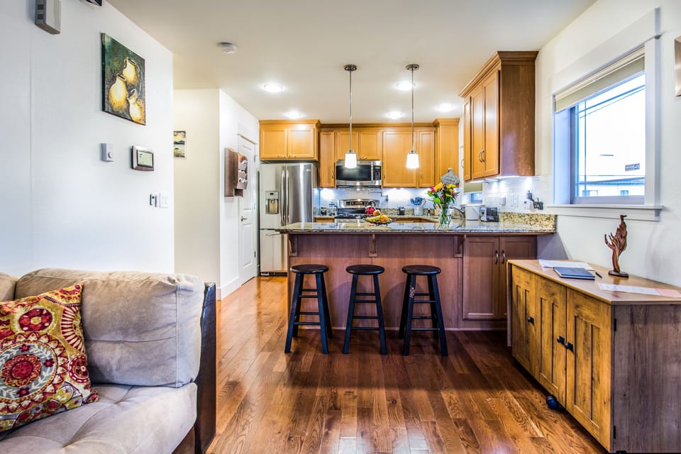 Living room cabinet has a selection of DVD's and board games.