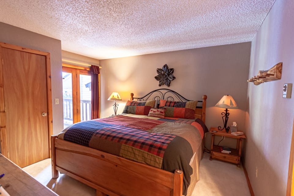 Master Bedroom with balcony overlooking Creek