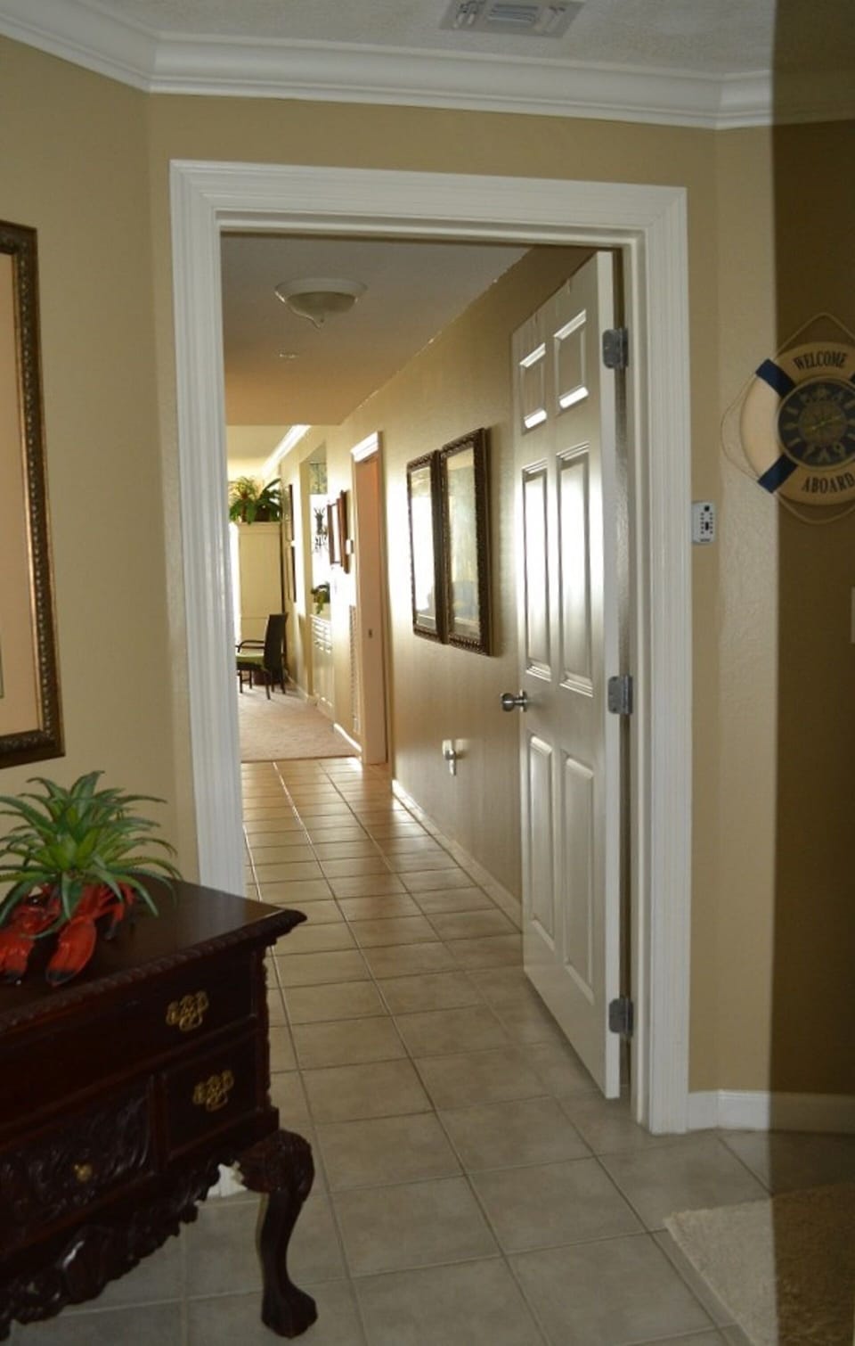 Foyer into living area, etc and lock out suite & bath/kitch behind photographer.