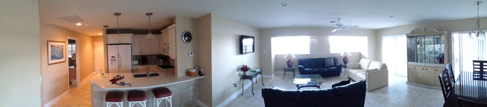 panoramic of living and kitchen