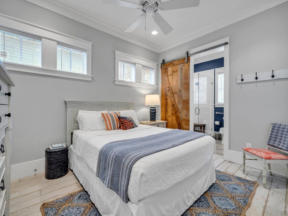 1st floor queen bedroom & on-suite bath with a walk-in shower.