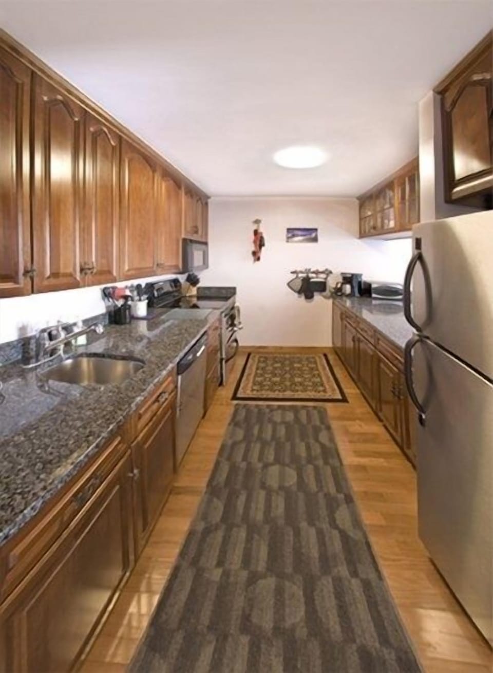 totally renovated granite, cherry, SS new appliances wood flooring