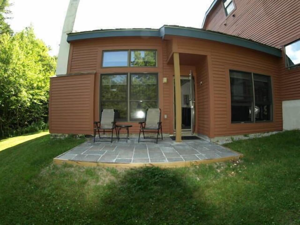 Exterior back of unit new patio and new patio furniture very private end unit!!