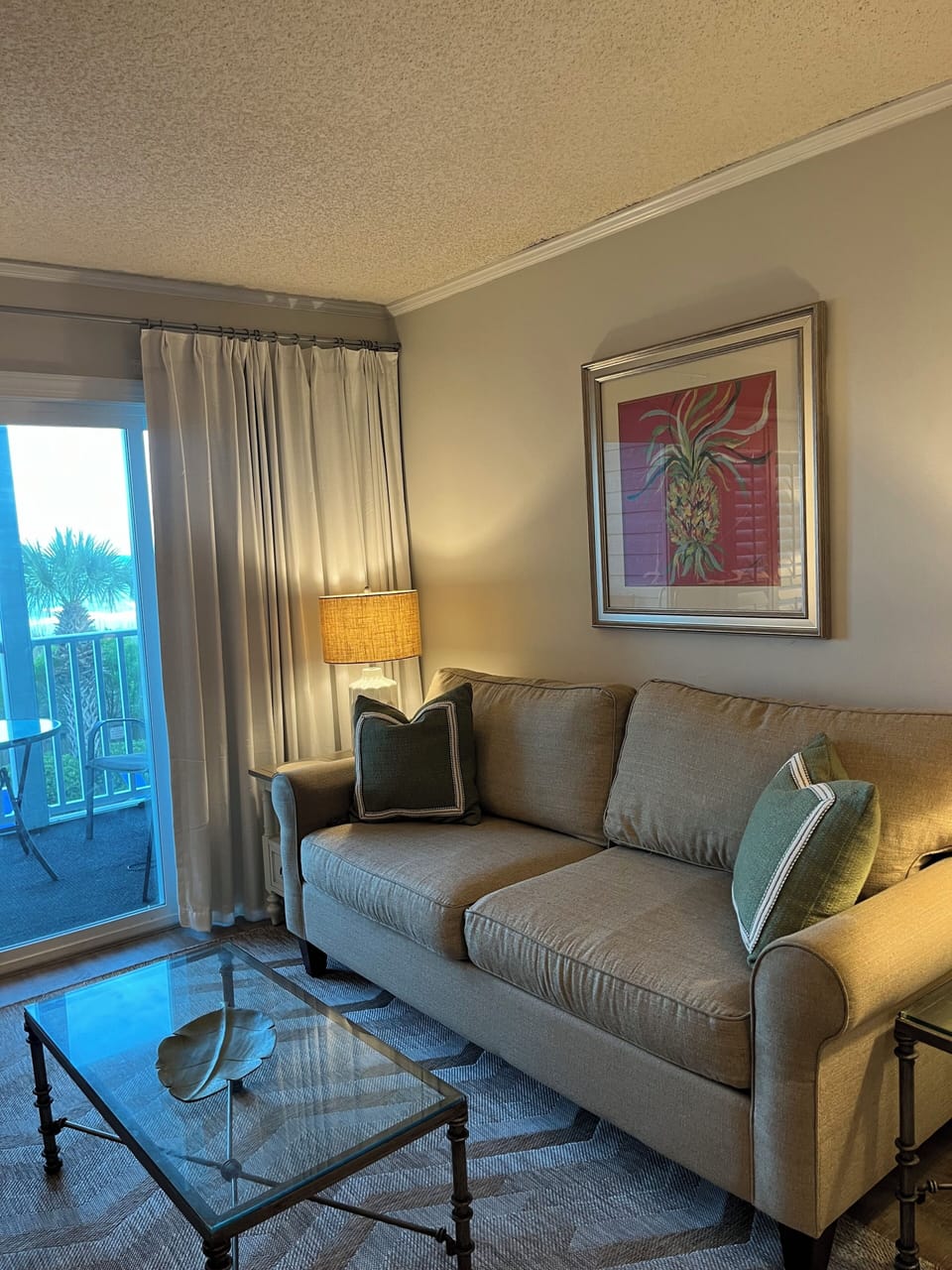 Living room with direct ocean view.  Open to the dining area and kitchen.
