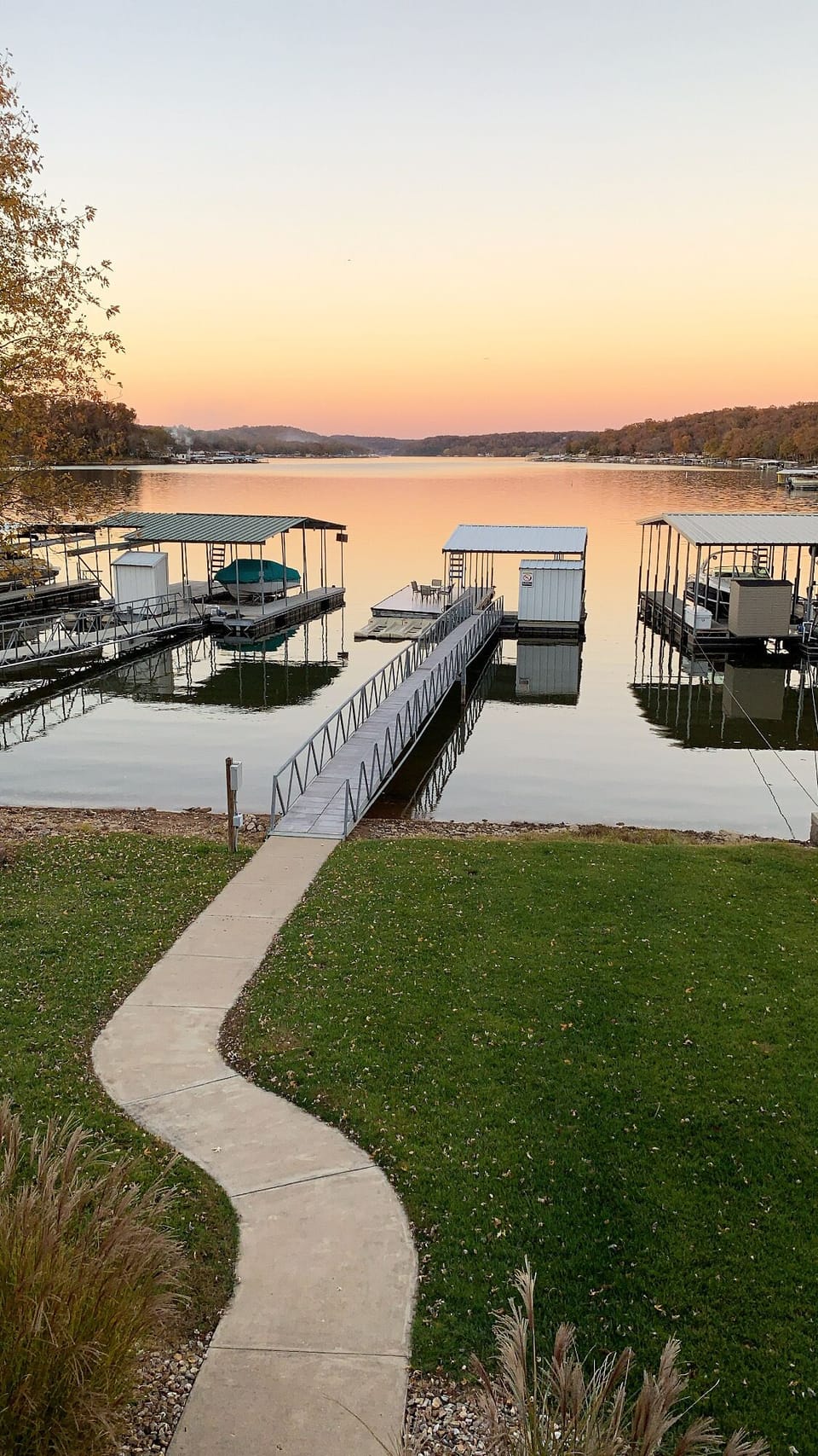 Private dock -11' x 30' slip, dock shed, swim platform, ladder, & 2 PWC lifts.