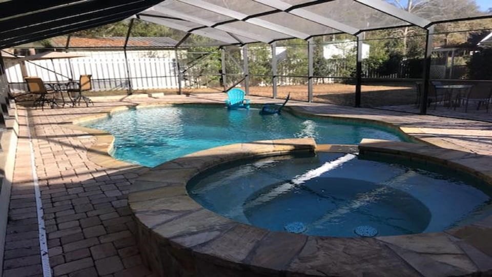 Private screen enclosed pool and hot tub