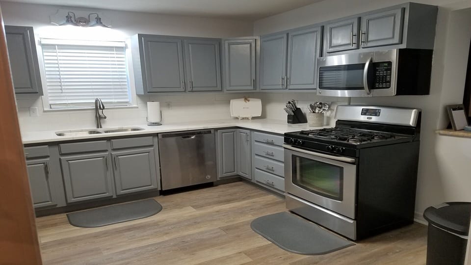 Large kitchen with granite countertops