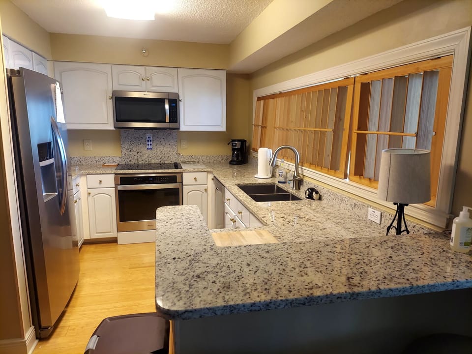 All new appliances and granite countertops in kitchen