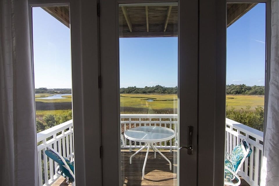 Enjoy meals on the deck with beautiful views & sunsets! Watch your guests kayak.