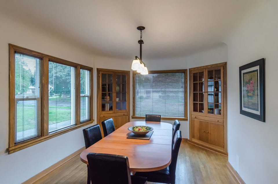 Large dining room with seating for 6. 