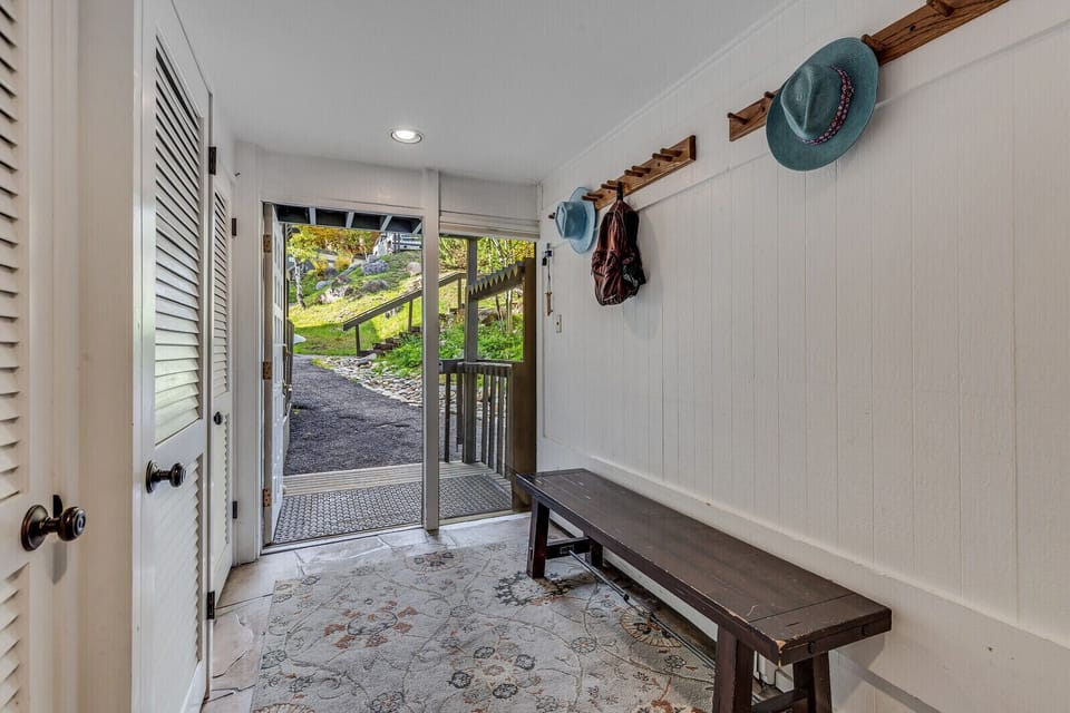 Front Door and Stairway up to the Pool, Hot Tubs, and Gym