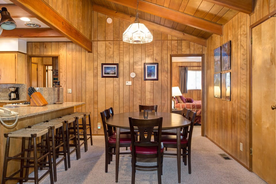 Dining table with seating for 6, additional seating at counter