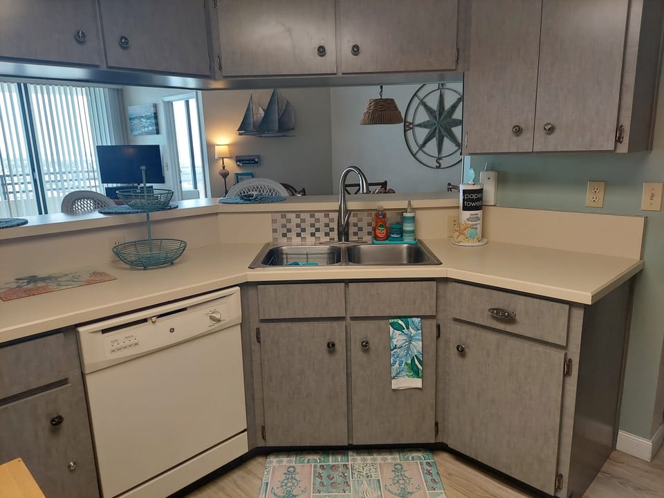 Beautiful new cabinets and faucet installed during a renovation just completed.
