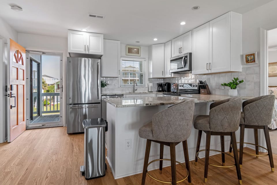 Newly Remodeled Kitchen with Barstools
