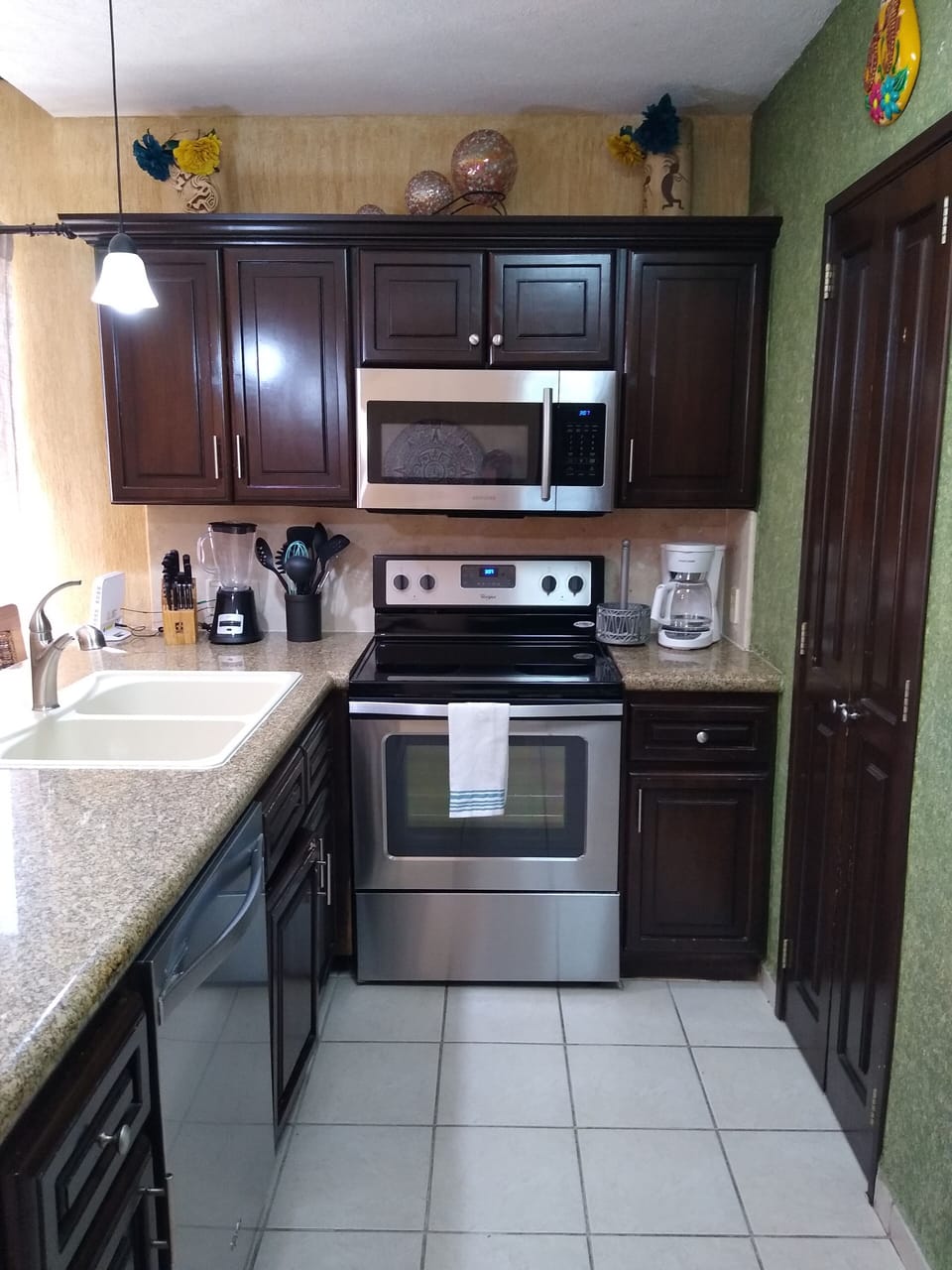 
kitchen area, stainless steel appliances